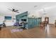 Bright living area featuring a dining area, a home office and a ceiling fan at 2098 Heathwood St, Deltona, FL 32725