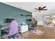 Bright living area featuring a home office with a ceiling fan at 2098 Heathwood St, Deltona, FL 32725