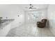 Bright dining area with tile floors, lots of natural light, and relaxing furniture at 22 Bradford Ct, Kissimmee, FL 34758
