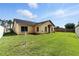 Charming home featuring a well-manicured lawn and neat landscaping at 22 Bradford Ct, Kissimmee, FL 34758
