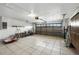 Spacious garage with tile flooring and ample storage space at 22 Bradford Ct, Kissimmee, FL 34758