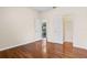 A bright bedroom has hardwood floors and access to an ensuite at 2256 Kettle Dr, Orlando, FL 32835
