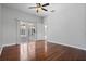The bedroom offers beautiful wood-look floors and access to a patio area at 2256 Kettle Dr, Orlando, FL 32835