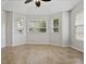 Bedroom featuring tile floors, neutral paint and large windows at 2256 Kettle Dr, Orlando, FL 32835