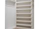 This large walk-in closet features built-in shelving at 2256 Kettle Dr, Orlando, FL 32835