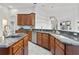 Well-equipped kitchen with granite countertops, stainless steel appliances, and sleek cabinetry for a modern culinary experience at 2256 Kettle Dr, Orlando, FL 32835