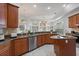 Large, well-equipped kitchen featuring granite countertops, stainless steel appliances, and ample cabinet space at 2256 Kettle Dr, Orlando, FL 32835