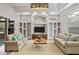Living room with built-in shelving, neutral paint, updated lighting, and new floors at 2256 Kettle Dr, Orlando, FL 32835
