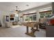 Entertaining space featuring a foosball table, TV, outdoor kitchen, and comfortable seating, perfect for gatherings at 2256 Kettle Dr, Orlando, FL 32835