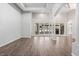 Spacious living room featuring hardwood floors, high ceilings, and a seamless transition to the outdoors through glass doors at 2256 Kettle Dr, Orlando, FL 32835