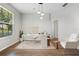 Bright home office features a modern desk, chair, and ample natural light at 2256 Kettle Dr, Orlando, FL 32835