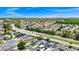 Aerial view featuring the home's location with a spacious neighborhood and well-kept roads at 235 Hidden Springs Cir, Kissimmee, FL 34743