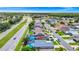Up high view of the home, pool, and spacious location near a well-developed street at 235 Hidden Springs Cir, Kissimmee, FL 34743