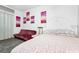Inviting bedroom with a double bed, futon, and neutral decor for a relaxing ambiance at 235 Hidden Springs Cir, Kissimmee, FL 34743