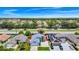Exterior view of a well-maintained, one-story home with a nice yard and a two car driveway at 235 Hidden Springs Cir, Kissimmee, FL 34743