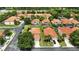 Community aerial view of homes, garages and beautiful landscaping at 255 Cordova Ave, Davenport, FL 33897