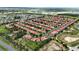 An aerial view showcases the community's homes and landscaping at 255 Cordova Ave, Davenport, FL 33897