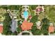 Overhead view of community pool, putting green, parking, clubhouse and gathering areas at 255 Cordova Ave, Davenport, FL 33897