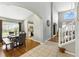 Foyer view showcasing the dining area, staircase, and an open layout at 255 Cordova Ave, Davenport, FL 33897