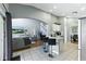 Open-concept living room and kitchen features a breakfast bar and comfortable seating area at 255 Cordova Ave, Davenport, FL 33897