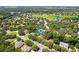 An aerial view of the neighborhood shows the home's location at 2613 Breezy Meadow Rd, Apopka, FL 32712