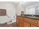 Spacious bathroom with a double vanity with granite countertop and walk-in shower at 2613 Breezy Meadow Rd, Apopka, FL 32712