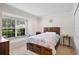 Bedroom featuring a large window seat, neutral colors, and carpeted floors at 2613 Breezy Meadow Rd, Apopka, FL 32712
