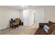 This living room features a sofa and an office at 2613 Breezy Meadow Rd, Apopka, FL 32712