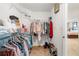 Large walk-in closet featuring clothing racks and storage space at 2613 Breezy Meadow Rd, Apopka, FL 32712