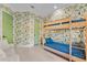 Bright, whimsical bunk bedroom features unique wallpaper and comfortable seating at 2781 Stanfield Ave, Orlando, FL 32814