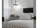 Cozy bedroom featuring a comfortable bed with stylish linens and a decorative chandelier at 2781 Stanfield Ave, Orlando, FL 32814