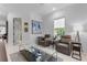 Bright living room with modern decor, stylish furniture, and exterior view at 2781 Stanfield Ave, Orlando, FL 32814