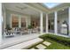Covered outdoor patio featuring comfortable seating and outdoor dining area at 2781 Stanfield Ave, Orlando, FL 32814