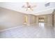 Spacious living room with tiled floors, ceiling fan, and lots of natural light at 2918 E Central Blvd, Orlando, FL 32803