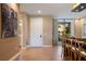 Inviting entryway with tile flooring and a view of the dining area at 3056 Rockefeller Way, Kissimmee, FL 34747