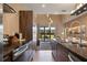 Contemporary kitchen featuring stainless steel appliances and modern cabinetry at 3056 Rockefeller Way, Kissimmee, FL 34747