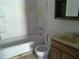 A bathroom featuring a shower-tub, toilet, and vanity at 31429 Anna St, Deland, FL 32720