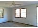 A room with two windows, a door, and overhead lighting at 31429 Anna St, Deland, FL 32720
