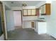 Kitchen area featuring minimal cabinetry, a double sink, and natural light from the window at 31429 Anna St, Deland, FL 32720