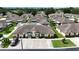 Aerial view of homes with community pool, showing private parking and landscaping at 3280 Villa Way Cir, St Cloud, FL 34769