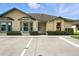 Charming single-story home featuring a well-maintained lawn, manicured shrubs and ample parking at 3280 Villa Way Cir, St Cloud, FL 34769