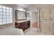 Bathroom with a soaking tub, glass enclosed shower and a dual sink vanity at 3519 Gatlin Place Cir, Orlando, FL 32812