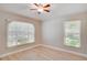 Bedroom with laminate floors, and natural light at 3519 Gatlin Place Cir, Orlando, FL 32812