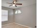 This bedroom has neutral walls, light-colored wood floors, ceiling fan, and white blinds at 3519 Gatlin Place Cir, Orlando, FL 32812