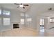 Spacious living room with a fireplace, vaulted ceilings, and wood floors at 3519 Gatlin Place Cir, Orlando, FL 32812