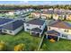 An aerial view of the neighborhood showcasing the home's backyard, nearby homes, and well-maintained lawns at 4316 Foggy Oak Ln, Sanford, FL 32773