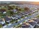 An aerial view of a neighborhood showcasing the well-maintained homes and green spaces at 4316 Foggy Oak Ln, Sanford, FL 32773