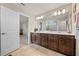 Bathroom featuring double sinks and stylish vanity with lots of storage space at 4316 Foggy Oak Ln, Sanford, FL 32773