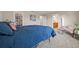 Bedroom featuring a large bed with a view into the bathroom and closet at 4316 Foggy Oak Ln, Sanford, FL 32773