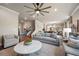 Spacious living room with modern decor, neutral tones, and ample seating for comfortable living at 4316 Foggy Oak Ln, Sanford, FL 32773